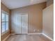 This bedroom features modern flooring, natural light and a closet at 38 Lake Walden Trl, Ormond Beach, FL 32174