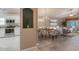 Open floor plan with kitchen, dining area, and living room, perfect for entertaining at 38 Lake Walden Trl, Ormond Beach, FL 32174
