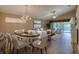 Inviting living space with elegant chandelier and comfortable seating at 38 Lake Walden Trl, Ormond Beach, FL 32174