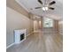 Open floor plan showcasing the living room with fireplace leading to the dining room at 38 Lake Walden Trl, Ormond Beach, FL 32174