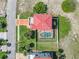 Aerial view of the property showcasing its layout, pool, landscaping, and proximity to the surrounding neighborhood at 3817 Islamorada Dr, Ormond Beach, FL 32176