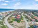 Wide aerial view of a home, showcasing its location near the beach and lake at 3817 Islamorada Dr, Ormond Beach, FL 32176