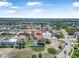 A high angle aerial view of a home featuring a pool and a peaceful community setting at 3817 Islamorada Dr, Ormond Beach, FL 32176
