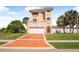 The front of the home has a driveway and a two-car garage at 3817 Islamorada Dr, Ormond Beach, FL 32176