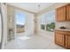 Well-lit breakfast nook with sliding glass doors opening to an outdoor balcony at 3817 Islamorada Dr, Ormond Beach, FL 32176