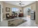 Cozy living room with tile floors, a bar, sliding doors leading to outdoor space and a mini fridge at 3817 Islamorada Dr, Ormond Beach, FL 32176