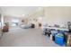A large main bedroom offers ample space, carpeted floors, a ceiling fan, and natural light from surrounding windows at 3817 Islamorada Dr, Ormond Beach, FL 32176