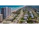 Real estate with ocean view featuring nearby street and building; stunning coastline view in beautiful location at 3855 S Atlantic Ave # 405, Daytona Beach, FL 32118
