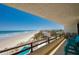 Expansive balcony view capturing the beautiful coastline, beach, and nearby town at 3855 S Atlantic Ave # 405, Daytona Beach, FL 32118
