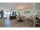 Dining area with ocean views, chandelier and seating for six at 3855 S Atlantic Ave # 405, Daytona Beach, FL 32118