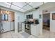 Well-equipped kitchen with laundry hook-ups and stainless-steel appliances at 3855 S Atlantic Ave # 405, Daytona Beach, FL 32118