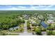 An aerial view shows the property's location within the community and landscape at 4 Huntsman Look, Ormond Beach, FL 32174