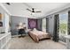 Bedroom with carpet, fan, and windows at 4 Huntsman Look, Ormond Beach, FL 32174