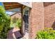 Inviting entrance featuring a classic brick exterior and a decorative wreath on the front door at 4 Huntsman Look, Ormond Beach, FL 32174
