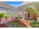 Charming entrance with beautiful lattice details and a well-maintained garden area at 4 Huntsman Look, Ormond Beach, FL 32174