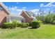 Beautiful brick home with mature landscaping, providing privacy and curb appeal at 4 Huntsman Look, Ormond Beach, FL 32174