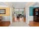 Spacious living room featuring a grand piano and an open floor plan that seamlessly connects to other areas at 4 Huntsman Look, Ormond Beach, FL 32174