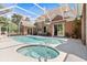Large screened pool and hot tub area with brick house, offering a private outdoor oasis at 4 Huntsman Look, Ormond Beach, FL 32174
