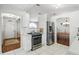 Clean kitchen with tile floors, white cabinets, and stainless steel appliances at 417 Jeffers St, Deltona, FL 32725