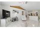 Cozy living room with tile floors, a ceiling fan, and neutral decor at 417 Jeffers St, Deltona, FL 32725