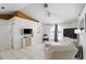 Bright living room featuring a vaulted ceiling, tile floors, and neutral decor at 417 Jeffers St, Deltona, FL 32725