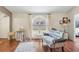 Comfortable living room featuring hardwood floors and large windows at 417 Jeffers St, Deltona, FL 32725