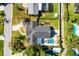 Aerial view of the property showcasing the house, pool, driveway, and surrounding landscaping and boundaries at 426 N Boyd St, Winter Garden, FL 34787