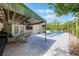 Backyard patio featuring an outdoor eating area and a view of the pool and hot tub at 426 N Boyd St, Winter Garden, FL 34787