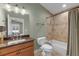 Updated bathroom with a new sink, vanity, tile backsplash, and a combined shower and tub at 426 N Boyd St, Winter Garden, FL 34787