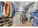 The walk-in closet has built-in shelving and organizers for optimal storage at 426 N Boyd St, Winter Garden, FL 34787