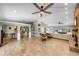 Open floor plan showcasing a spacious living area with tile floors and stylish furnishings at 426 N Boyd St, Winter Garden, FL 34787