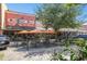Outdoor seating area in front of the Moon Cricket Grille restaurant at 426 N Boyd St, Winter Garden, FL 34787