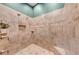 This bathroom has a tiled walk in shower and tile flooring at 426 N Boyd St, Winter Garden, FL 34787