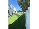New fenced-in backyard, well-manicured lawn at 4339 Northern Dancer Way, Orlando, FL 32826