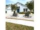 Beautiful home featuring a well-maintained front yard with unique decorative trees and rock gardens at 4339 Northern Dancer Way, Orlando, FL 32826