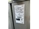 Close-up of Lennox HVAC unit specifications, ensuring efficient home climate control at 4339 Northern Dancer Way, Orlando, FL 32826