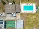 Overhead view showcasing a community pool and shuffleboard court at 44 Florence Blvd, Debary, FL 32713