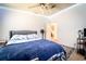 Bright bedroom with blue accents, neutral walls and fan at 44 Florence Blvd, Debary, FL 32713