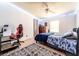 Secondary bedroom with a desk and gaming chair at 44 Florence Blvd, Debary, FL 32713