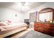Bedroom with neutral walls and a dresser at 44 Florence Blvd, Debary, FL 32713