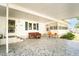 Inviting covered carport area, perfect for outdoor seating and relaxation at 44 Florence Blvd, Debary, FL 32713
