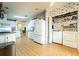 A functional kitchen area with full-sized appliances and storage, also features in-unit laundry facilities at 44 Florence Blvd, Debary, FL 32713