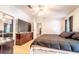 A cozy main bedroom featuring a plush bed, dresser, and closet space, designed for rest and relaxation at 44 Florence Blvd, Debary, FL 32713