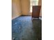 Bedroom with an old dresser and dated blue carpet in need of updating or replacement at 461 Marigold Rd, Casselberry, FL 32707