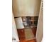 Damaged closet with exposed pipes and missing drywall, revealing repair needs in this fixer-upper property at 461 Marigold Rd, Casselberry, FL 32707