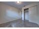Bedroom showcasing a spacious closet with sliding doors and neutral carpet at 508 W Hogle Ave, Deland, FL 32720