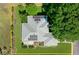 Aerial view of a single-story home featuring solar panels on the roof at 5097 Nw 19Th Pl, Ocala, FL 34482