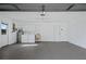 Spacious two car garage with epoxy floor and laundry including washer and dryer at 5097 Nw 19Th Pl, Ocala, FL 34482