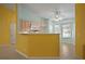 Bright kitchen featuring tile floors, and a convenient breakfast bar for casual dining at 5097 Nw 19Th Pl, Ocala, FL 34482