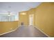 Open-concept living space featuring tiled floors, neutral paint and ample natural light at 5097 Nw 19Th Pl, Ocala, FL 34482